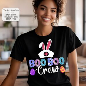 A mockup of a woman wearing a black t-shirt with the text "Boo Boo Crew" alongside a medical cross and bunny ears.