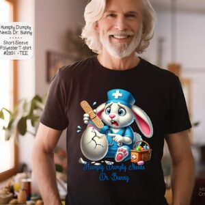 A mockup of an older man wearing a black t-shirt featuring a cool cartoon bunny wearing sunglasses and holding a bat.