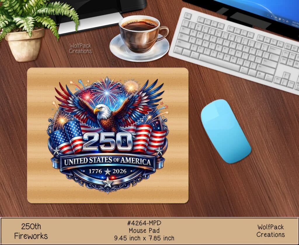 A rectangular mousepad on a wooden desk next to a coffee cup and mouse, displaying the circular bald eagle and "250" emblem.