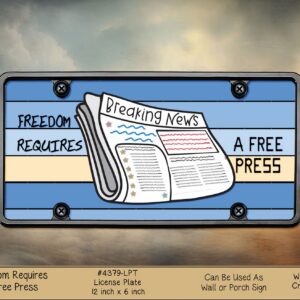A standard rectangular vehicle license plate displaying the folded "Breaking News" newspaper illustration alongside text that reads "A FREE PRESS".