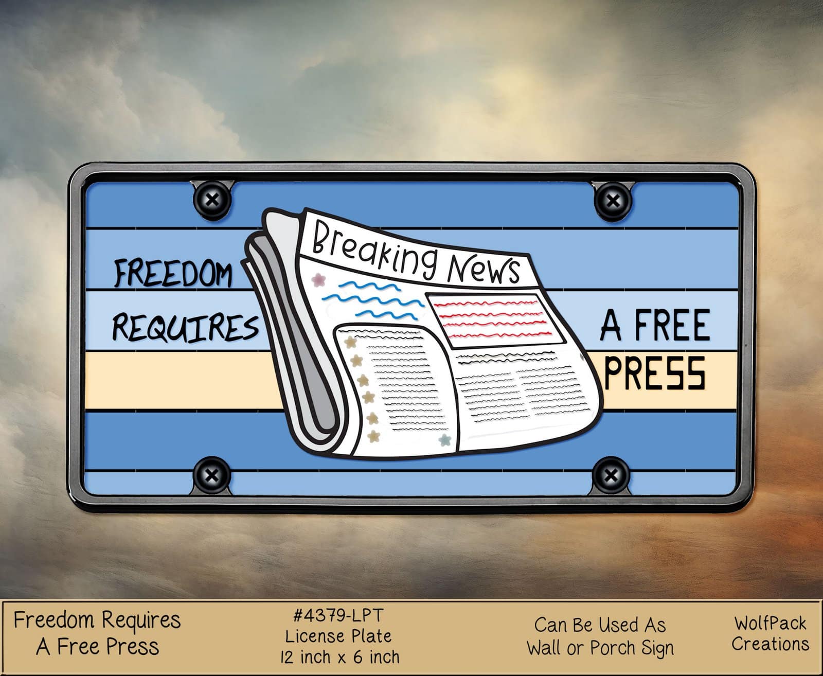A standard rectangular vehicle license plate displaying the folded "Breaking News" newspaper illustration alongside text that reads "A FREE PRESS".